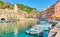 Harbour with boats and waterfront in Vernazza