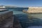 Harbour breakwater in Xemxija bay, Bugibba, Malta