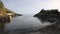 Harbour and coast entrance to Polperro Cornwall South West England UK smooth professional video pan