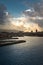 Harbour of Genoa Genova by sunset, Italy. View of the old port with a cloudy sky