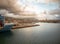 Harbour of Genoa Genova by sunset, Italy. View of the old port with a cloudy sky