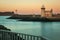 Harbour lighthouse at sunset. Howth. Dublin. Ireland