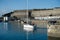 Harbour and Royal Citadel with yacht leaving port Plymouth England