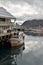 Harbour with smal fishing boats Norway rough cold wet