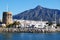 Harbour watchtower and town at Puerto Banus, Marbella.