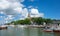 The harbour and waterfront of Naantali town in south-west Finland during a sunny summer day. The  medieval stone church was built