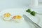 Hard boiled eggs sliced halves in white plate