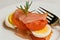 Hard boiled slice egg, tomato and smoked salmon
