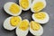 Hard Half Boiled Eggs, Sliced in Halves Food Ingredient Preparation Gray Textured Background
