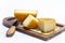 Hard Italian pecorino sheep cheese on wooden board