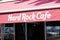 Hard Rock Cafe sign text and brand logo on facade coffee shop company