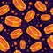 Hard round candies falling and melting. Seamless pattern of Halloween, trick or treat orange and yellow lollipops on a purple back