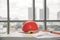 Hard safety helmet hats, construction equipment, blueprint on the table in conference office worker, architect working desk.