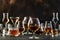 Hard strong alcoholic drinks, spirits and distillates in glasses in assortment: vodka, cognac, scotch, whiskey etc. Brown bar