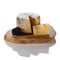 Hard truffle cheese and black truffles on a cutting board isolated on white