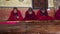 Hard working Bhutanese novice monks learning the Buddhism text in early morning , Bhutan