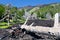 Hardened lava flow on green slope of Etna, Sicily