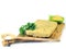Hardened polenta on wooden olive chopping board