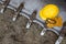 Hardhat, Gloves and Protective Glasses Resting on Bulldozer Buck