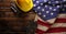 Hardhat, gloves, and tools on US American flag. Strong American workforce or industry, or America labor day