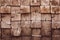 Hardwood background with pattern of dirty square planks. Brown grunge shabby wooden texture. Pine wood - material, copy space. Oak