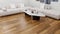 Hardwood floor made of natural wood newly installed interior of the living room.