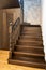 A hardwood staircase and stairwell storage