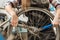 Hardworking craftswoman fixing the chain of the bicycle