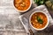 Harira soup in bowl on wooden table. Typical Moroccan food.