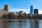 The Harlem Meer at Central Park with a Skyline View in New York City during Spring