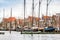 Harlingen, Nethrelands - January 10, 2020. Boats in water canal in downtown in winter