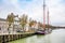 Harlingen, Nethrelands - January 10, 2020. Boats in water canal in downtown in winter