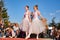 Harmonic Elegance: Teenage Ballerinas Illuminate the Open-Air Stage