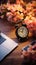 Harmonious arrangement Laptop, book, flower, alarm clock atop wooden backdrop in top view.