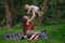Harmonious family outdoors. Happy loving mother and her baby. Mom playing with child