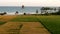 Harmonious Intersection: Rice Fields and Coastal Beauty