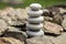 Harmony and balance, simple pebbles tower in another pebbles, simplicity, five stones