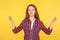 Harmony and inner peace. Portrait of happy calm ginger girl in checkered shirt practicing yoga, holding hands in namaste gesture