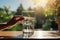 In harmony with nature, hands grasp glasses of water on a sunny table