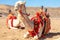 Harnessed riding camels resting in the desert, Al Ula