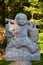 Harrington, QC, Canada - September 23, 2018: Small funny marble figurines in the territory of a Buddhist temple. Every