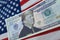 Harrisburg, PA - September 26, 2019 : Donald Trump 2020 Re-Election Presidential Dollar Bill against a United States of America