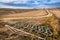 Harrows on a brown field in Tuscany at autumn