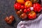 The harvest of assorted tomatoes. Colorful organic tomatoes on a large dish. Tomatoes different varieties.