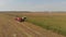 Harvest corn harvester and tractor in corn Silo Harvester Field