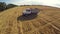 Harvest. Large truck transport grain from the field.