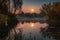 harvest moon above a lake, casting shimmering reflection on the water