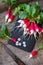 Harvest organics red radish. Organic vegetables. Fresh Radishes on wooden background. Top view flat lay.