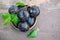 Harvest plums in a wooden dish on a wooden rustic background. Copy space. The view from the top