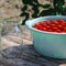 Harvest of red ripe tomatoes before winter preservation in glass jars